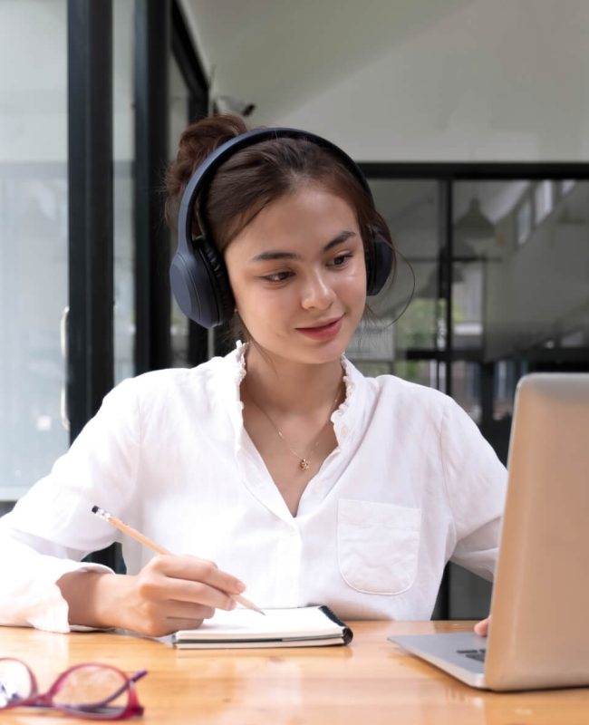 asian-woman-interpreter-write-translation-from-foreign-language-to-english-listen-to-audio-record-in.jpg